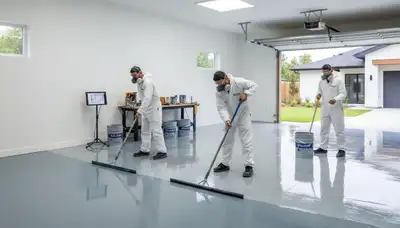 Epoxy floor coating applied by professional painters in Raleigh NC garage for durable finish