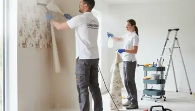 Professional wallpaper removal by house painters in Raleigh, NC preparing walls for fresh paint